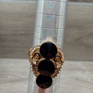 Elegant Gold Tone and Black Ring